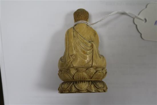A Japanese ivory figure of a Buddha